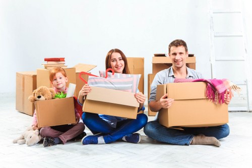 Flat removals in Richmond upon Thames with moving van outside apartment building