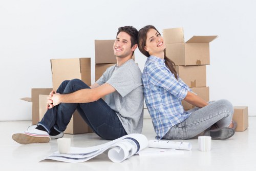 Moving team handling a customer complaint form during a house removal
