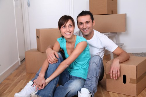 Furniture being loaded into a moving truck in Richmond upon Thames