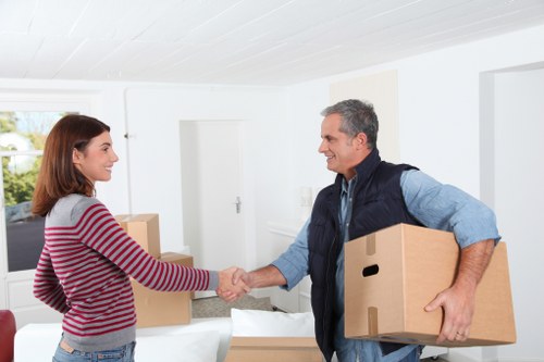 Careful loading of boxes and furniture by house removalists in Richmonduponthames