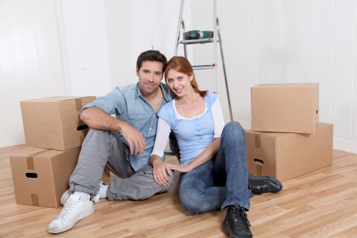 Packers organizing boxes for a house move in Richmond upon Thames